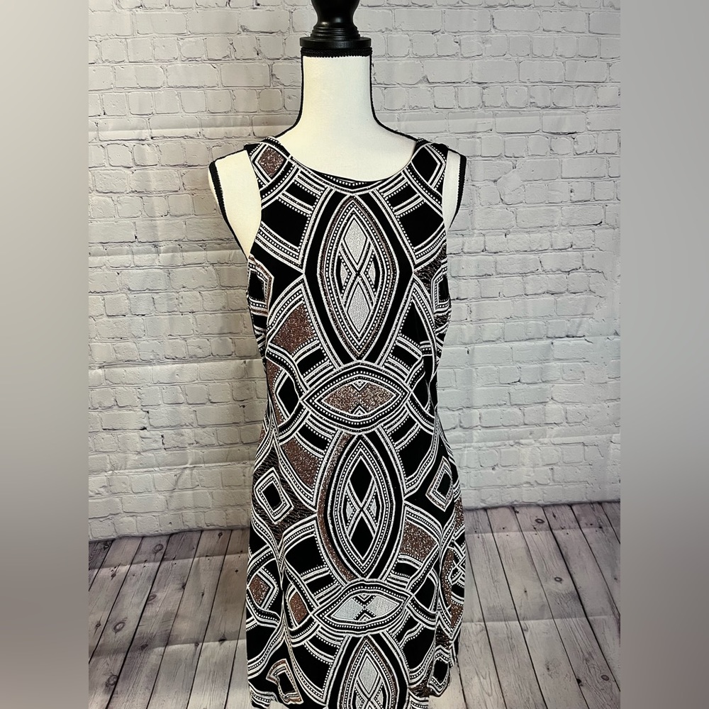 Cute party dress with gold shimmer